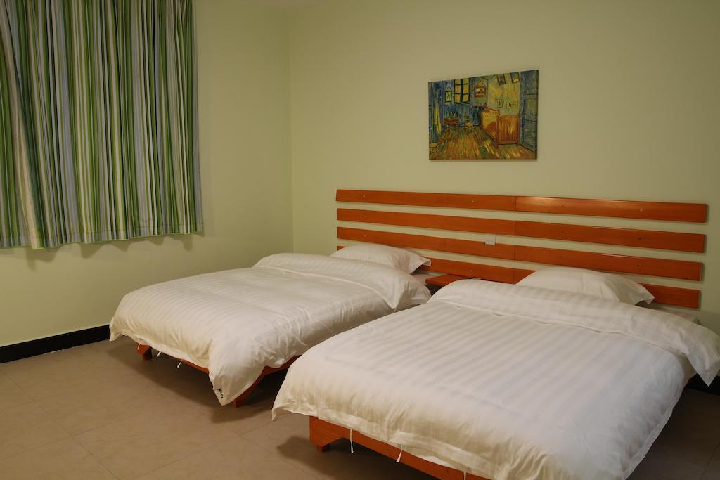 Tiffany Hostel Яншо Номер фото